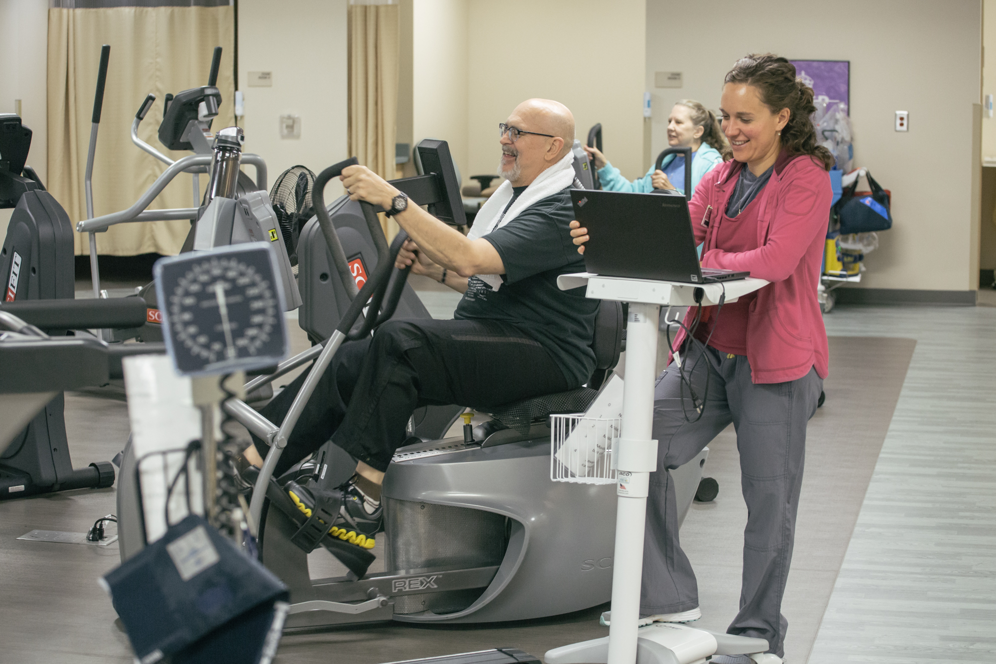 A patient doing rehab on a stationary bike
