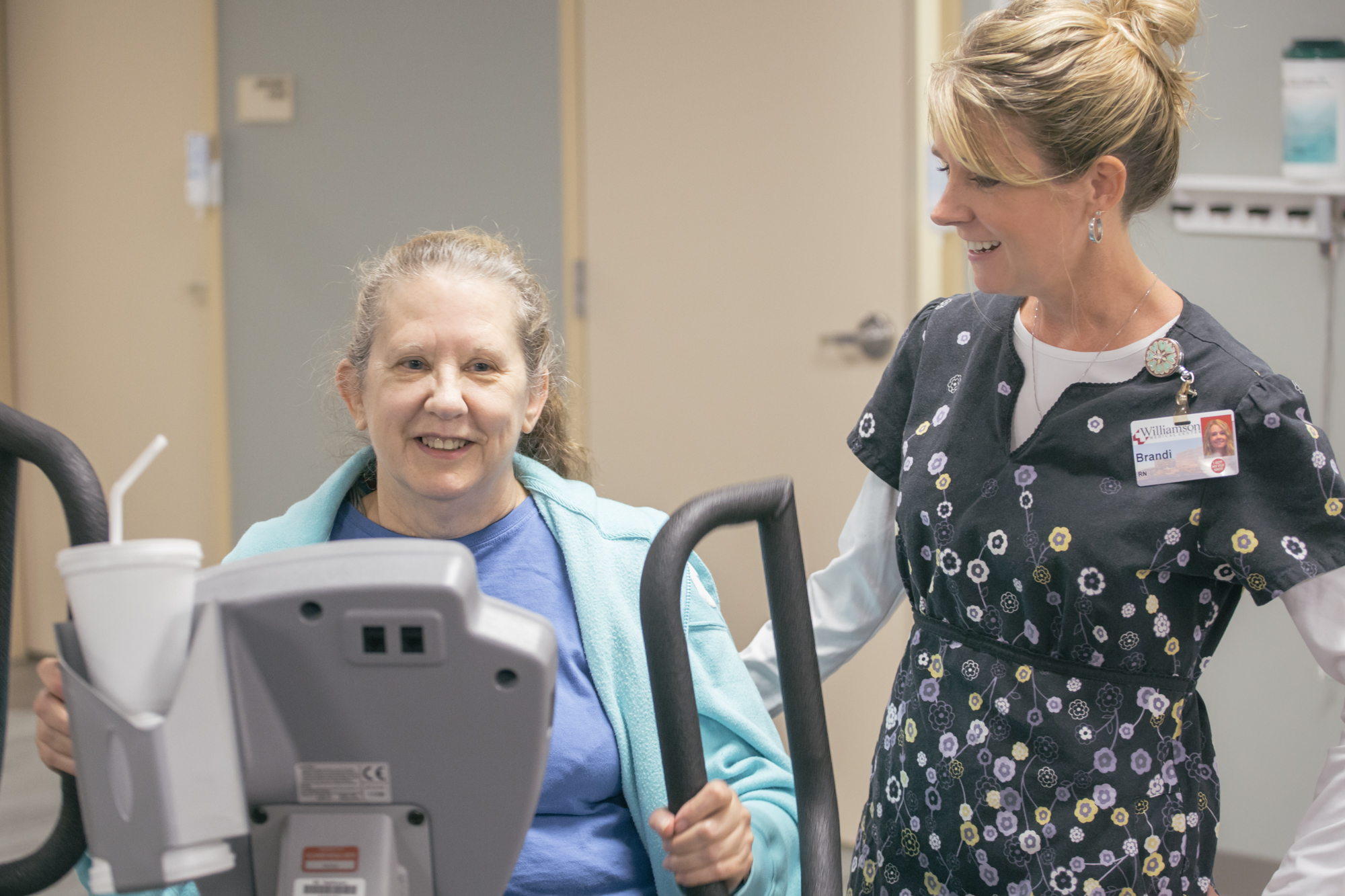 A patient and physical therapist