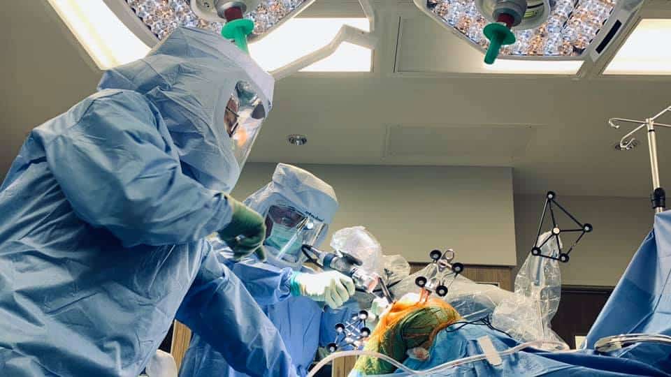 TBI surgeons operating