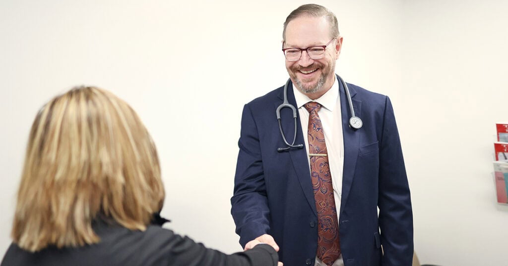 Troy Miller, D.O. with patient